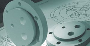 Technical ceramic components on an engineering drawing as a symbol of 40 years of manufacturing experience